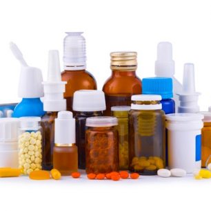 Composition of medicine bottles, pills and capsules isolated on white Composition of medicine bottles, pills and capsules isolated on white background.